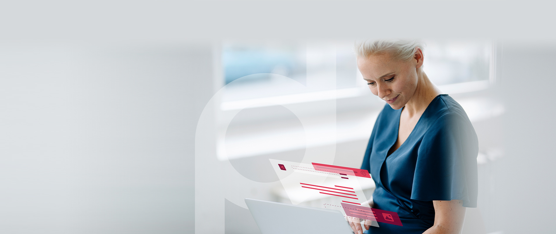 Image showing a middle-aged businesswoman relaxing at her laptop, with transparent graphics appearing above the display to visualise the user-friendliness of the software.